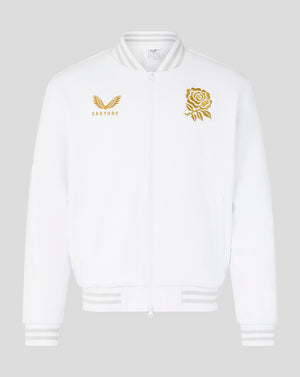 White bomber jacket front with gold wings logo on the left chest and gold rose emblem on the right chest.