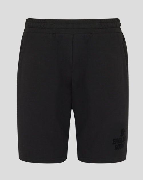 Black shorts with a brand logo on a light gray background