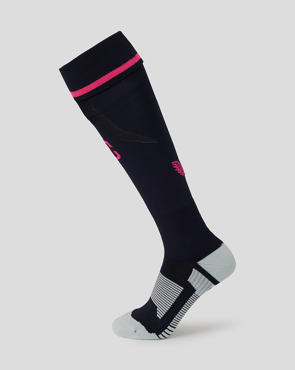 Black knee-high sock with pink trim on a light gray background