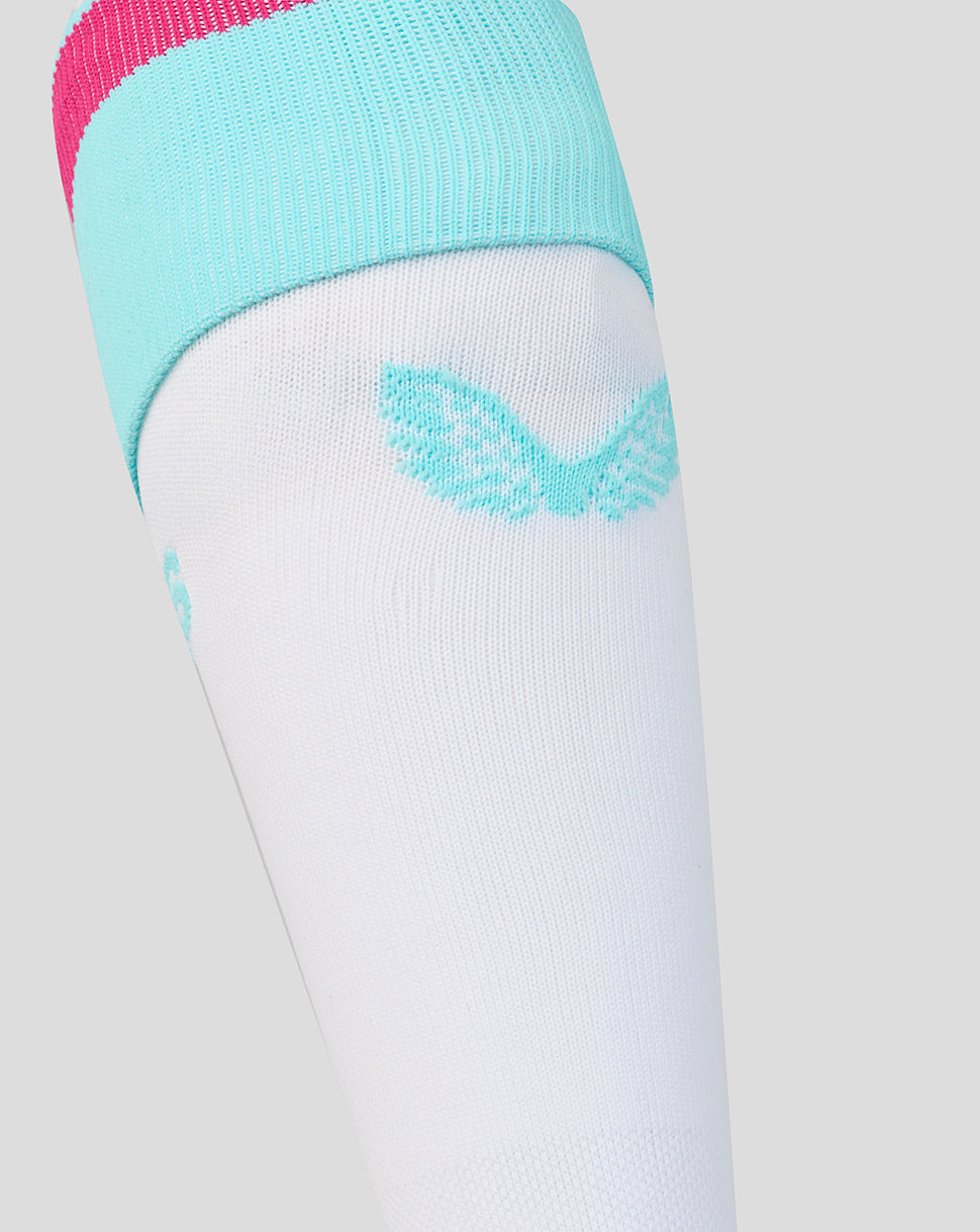 White knee-high sock with turquoise top and logo on a light gray background