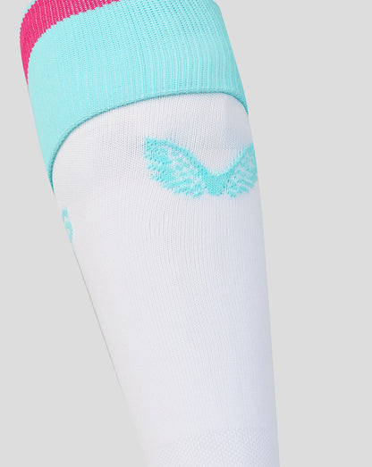 White knee-high sock with turquoise top and logo on a light gray background