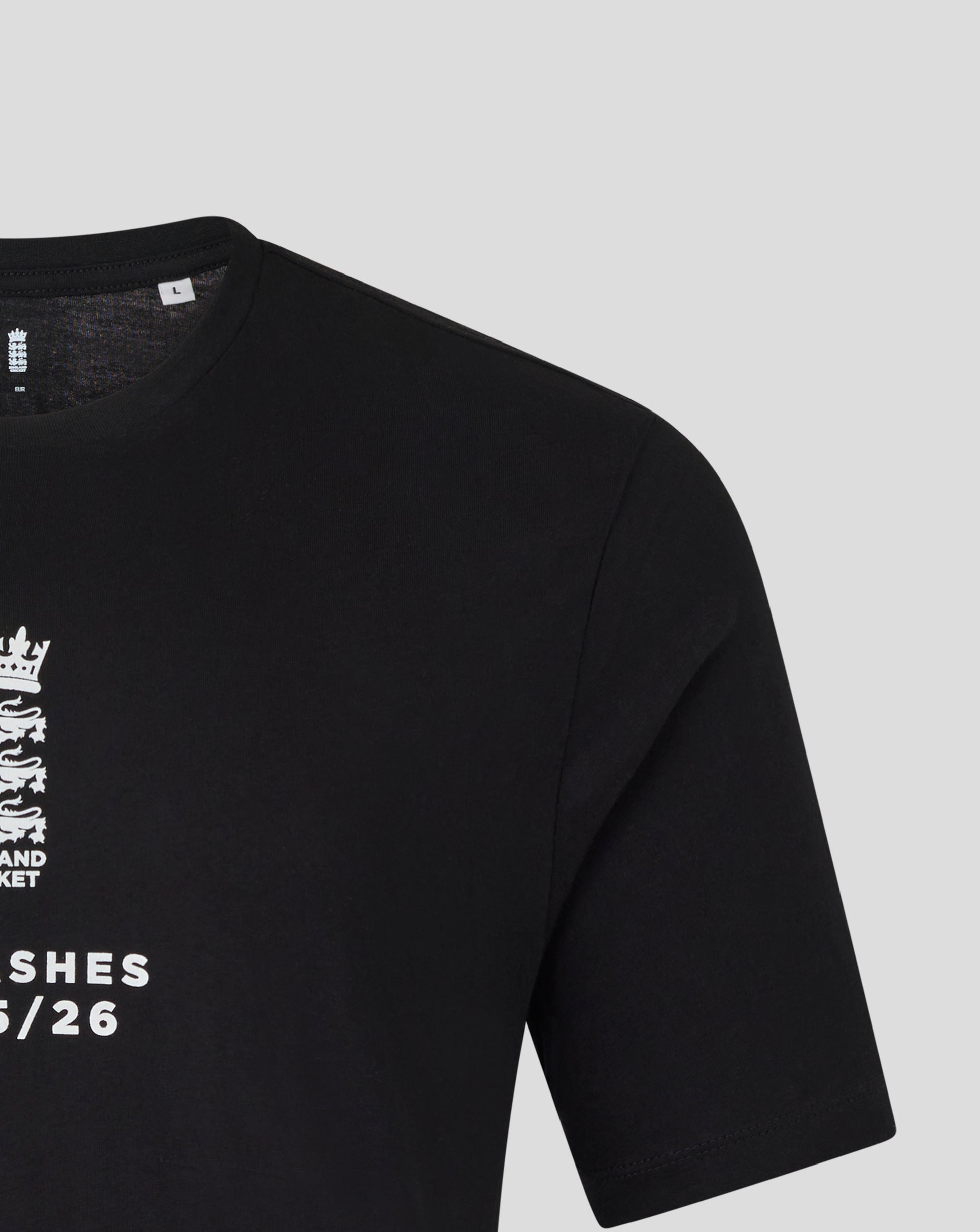 Black England cricket unisex Ashes T shirt close up showing white crest graphic near the chest