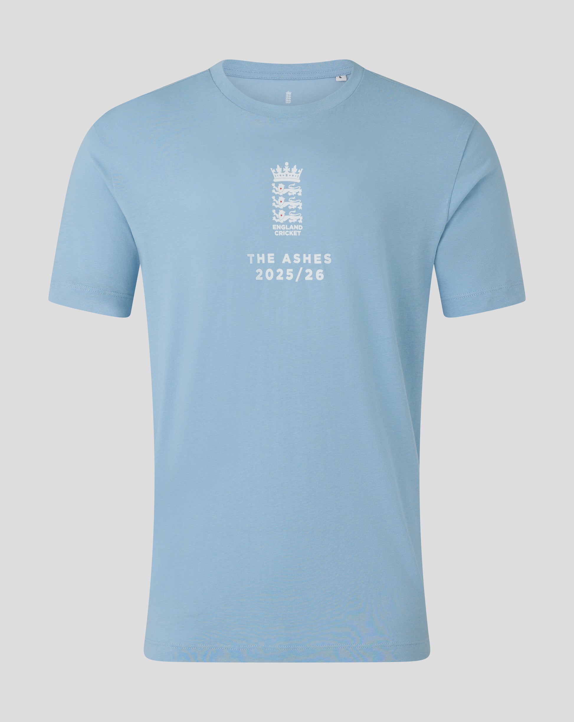 Light blue England Cricket Ashes T shirt with crest and The Ashes 2025/26 text centered on the front