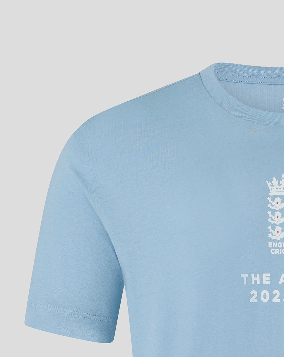 Light blue England cricket T shirt close up with crest and The Ashes 2025/26 text.