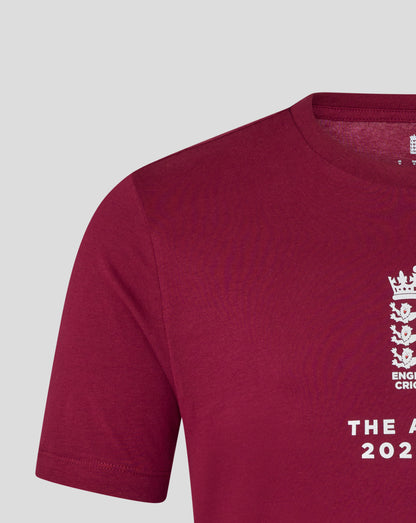 Front right chest area of burgundy T shirt showing white crest and large Ashes text