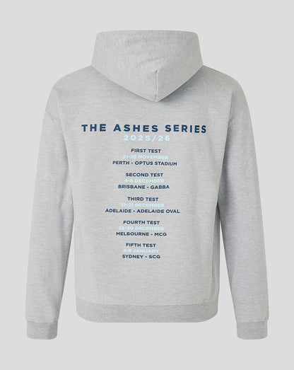 Light gray unisex England cricket hoodie shown from the back with The Ashes Series schedule printed in blue.