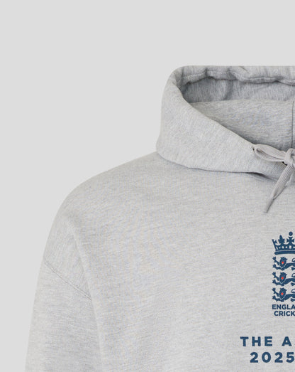 Close-up of light grey Ashes Tour hoodie showing hood and drawstring