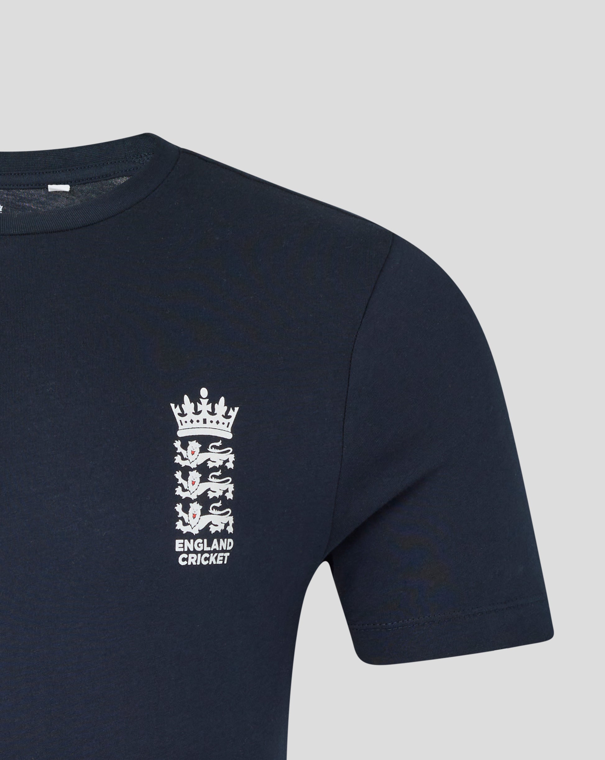 Close up of navy England cricket T shirt showing crest and white lettering on the chest area