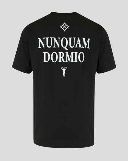 Black Nunquam Dormio T-shirt featuring large white lettering on back and small graphic beneath