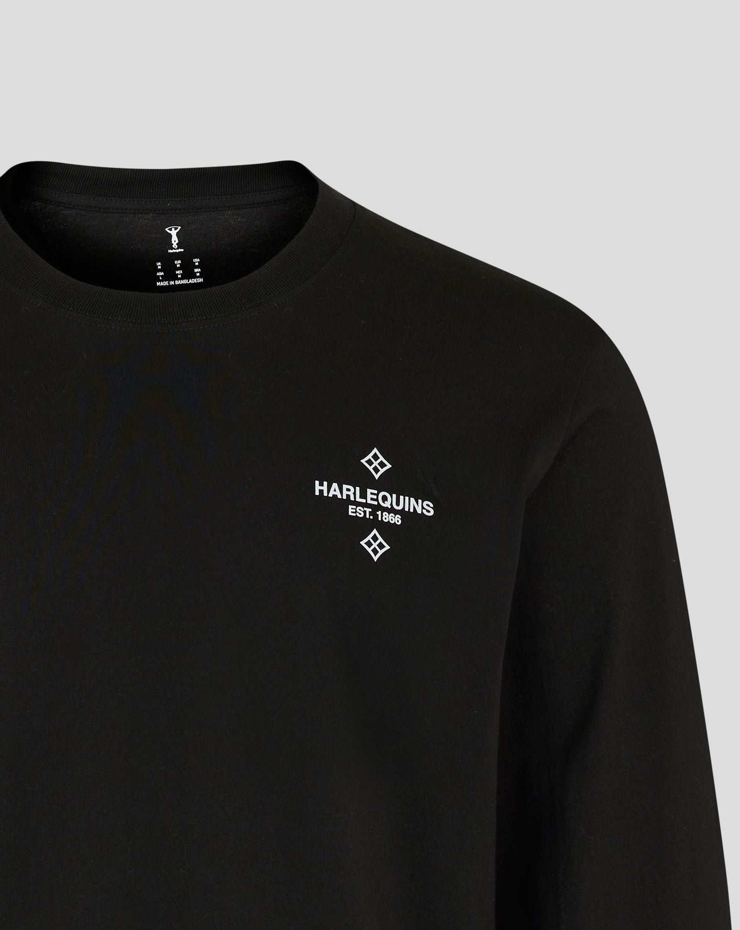 Harlequins Nunquam Dormio black long sleeve t shirt with white chest logo.