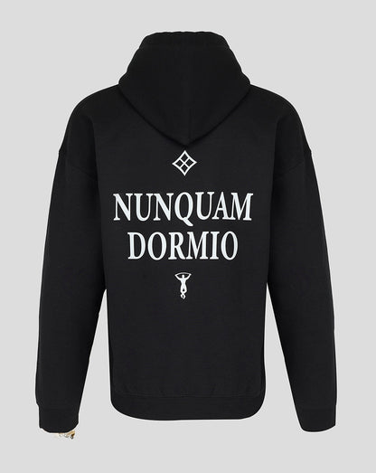 Back view of black Nunquam Dormio hoodie featuring large white typography and emblem on the upper back
