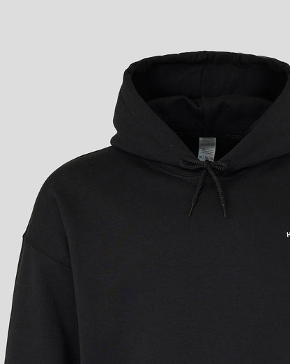Close-up of black Nunquam Dormio hoodie showing drawstring hood and tag