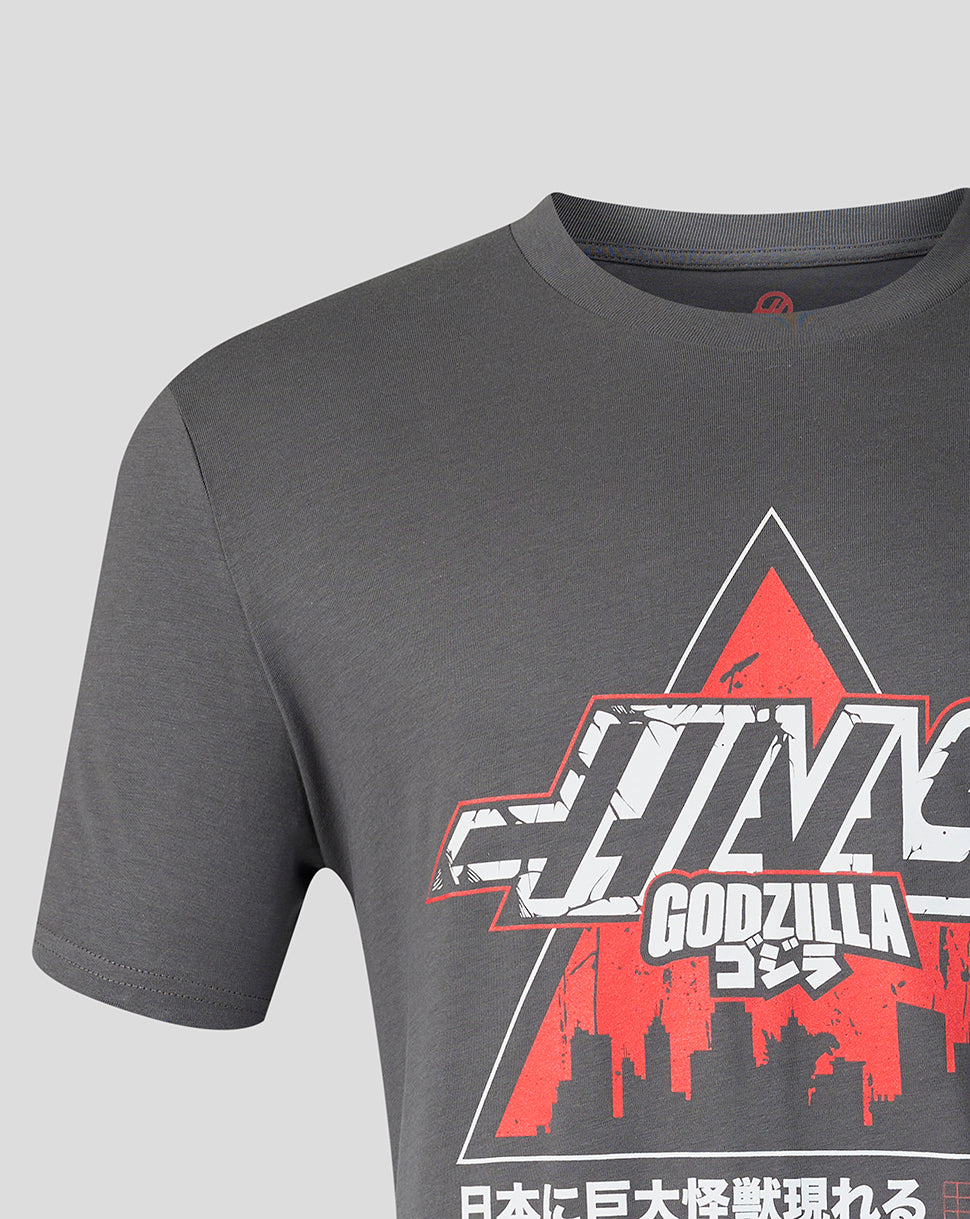 Gray unisex Godzilla Comic X Haas tee with bold white and red logo and city skyline graphic.