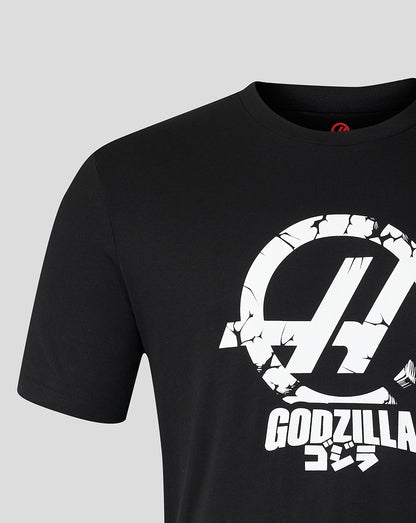 Close up of the front of the black Godzilla Tokyo Haas T shirt showing a large cracked circular emblem
