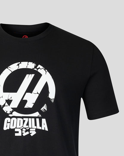 Detail of the front graphic on the black Godzilla Tokyo Haas tee with a prominent circular motif and GODZILLA text