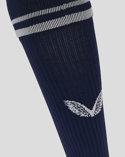 Navy football sock with white stripe cuff and white wing logo