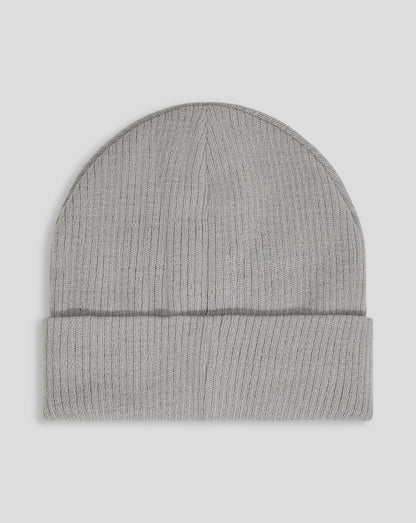 Gray ribbed knit beanie with fleece lining and Castore logo embroidery.