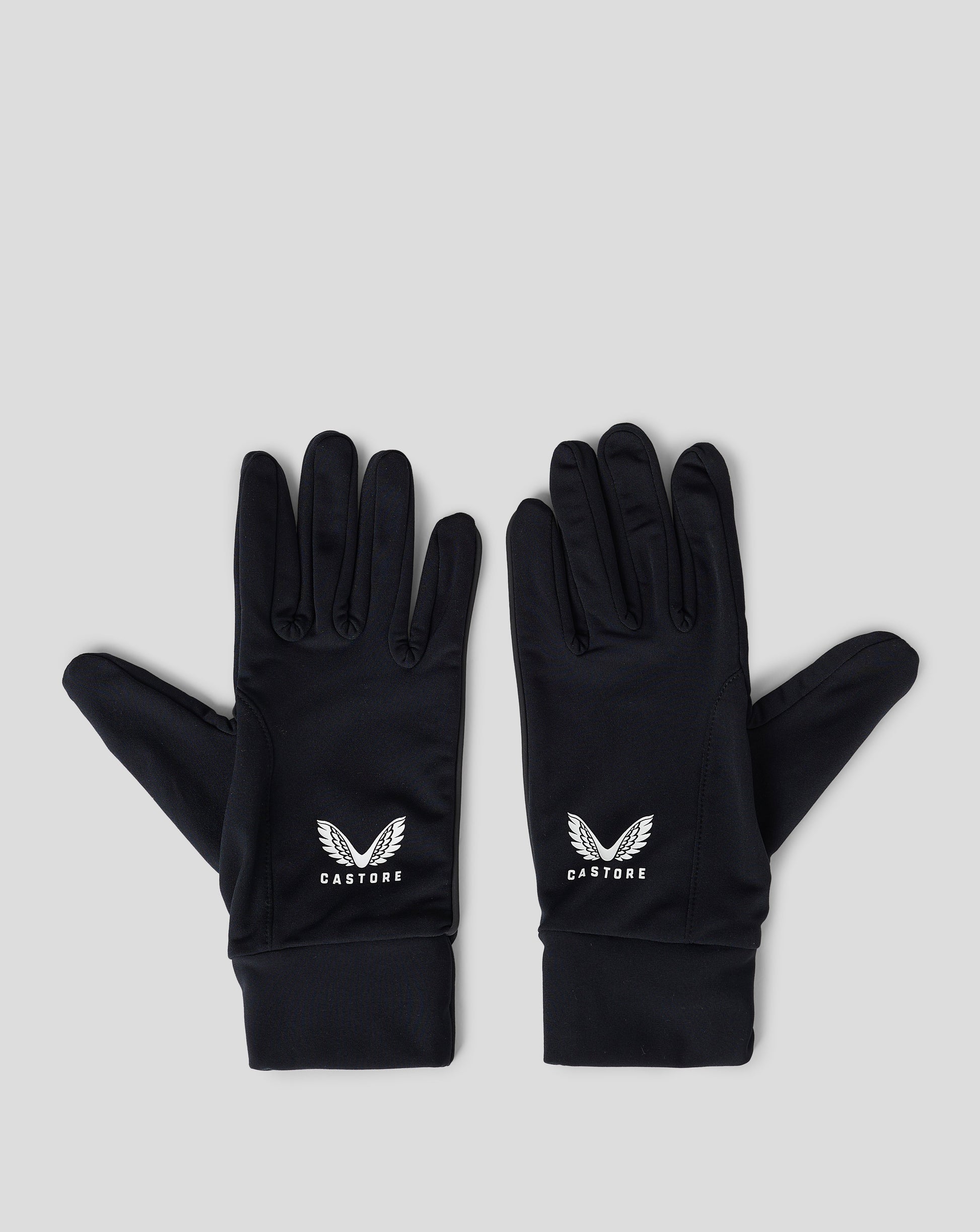 Pair of black performance gloves with folded cuffs touchscreen fingertips and reflective detail on the back