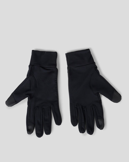 Gloves with white Castore wing logo visible on the cuffs