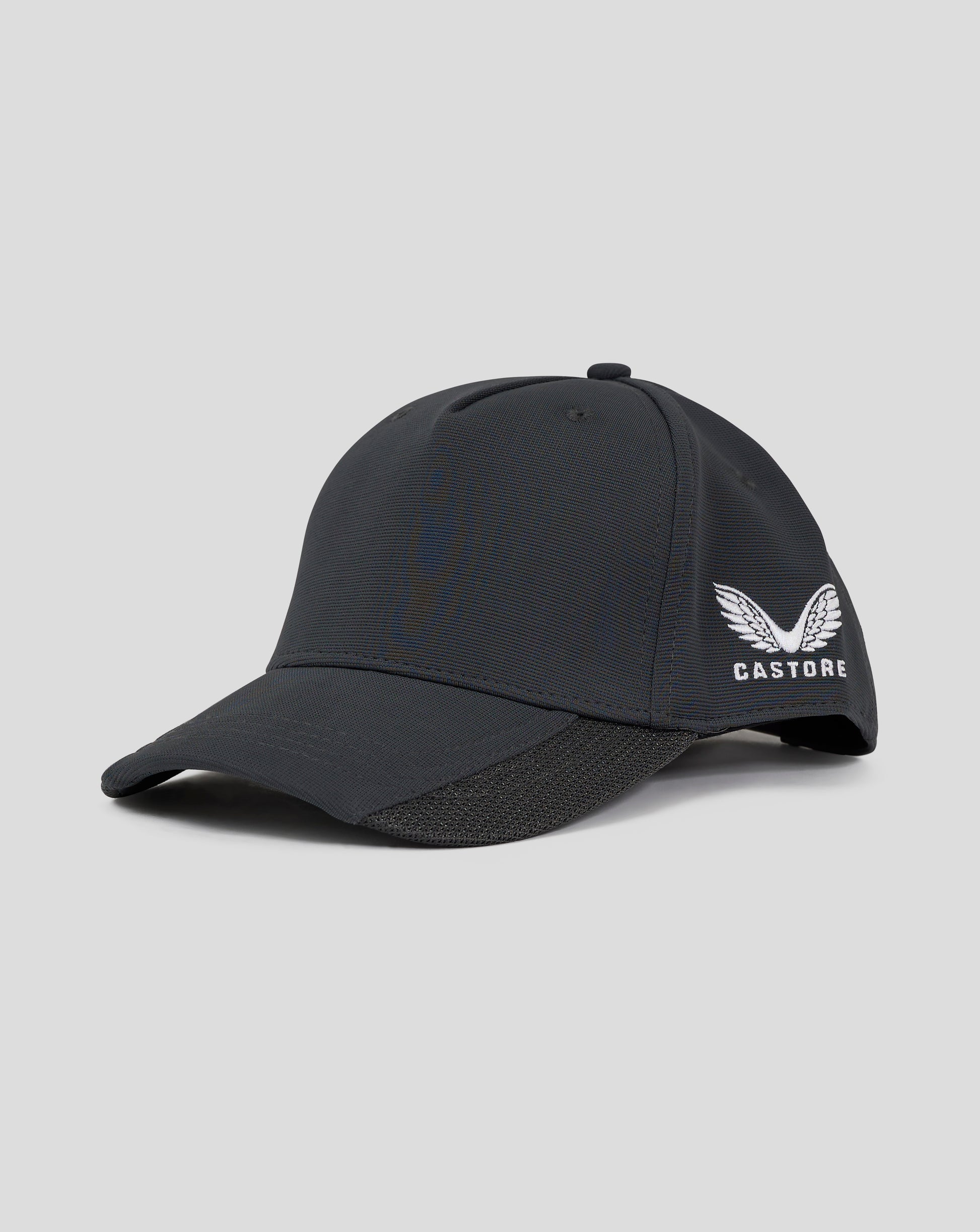 Side view of dark slate Castore 5 panel cap with embroidered logo and snap closure