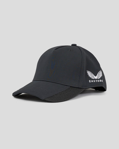 Side view of dark slate Castore 5 panel cap with embroidered logo and snap closure