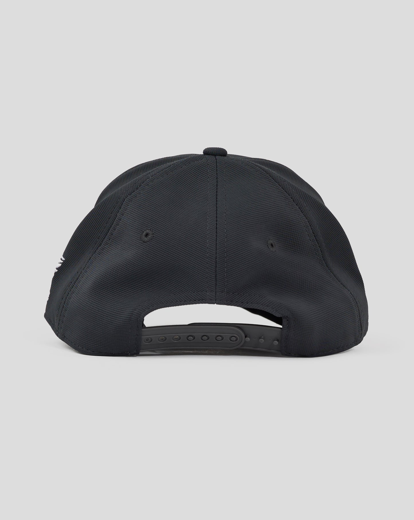 Rear view of dark slate 5 panel performance cap with a plastic snap closure and mesh peak