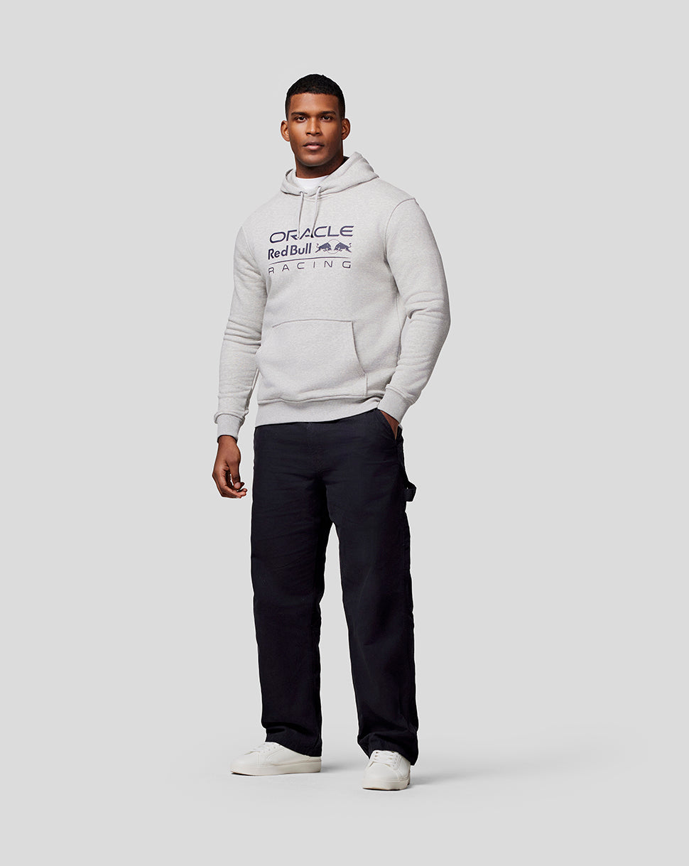 Male model wearing grey marl Oracle Red Bull Racing overhead hoodie with chest mono logo and drawstring hood.