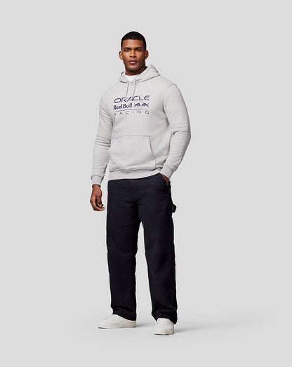 Male model wearing grey marl Oracle Red Bull Racing overhead hoodie with chest mono logo and drawstring hood.