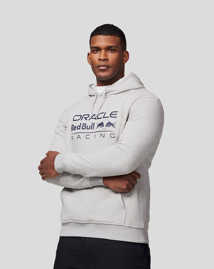 Male model in light grey marl hoodie with large Oracle Red Bull Racing chest logo and drawstring hood.