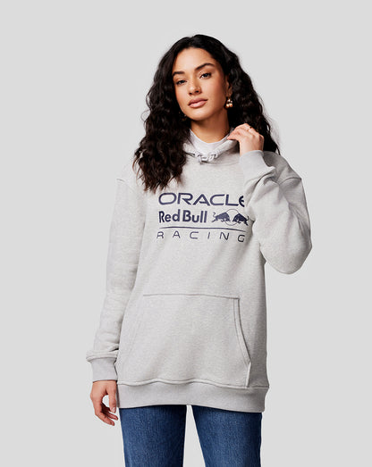 Woman wearing a light grey marl Oracle Red Bull Racing hoodie with chest logo
