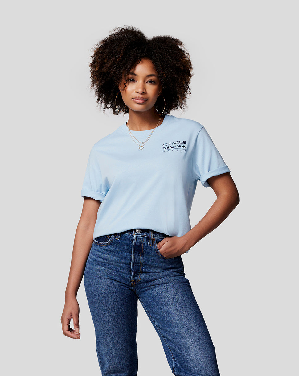 Front view of model wearing Dream Blue Core Tee with left chest branding