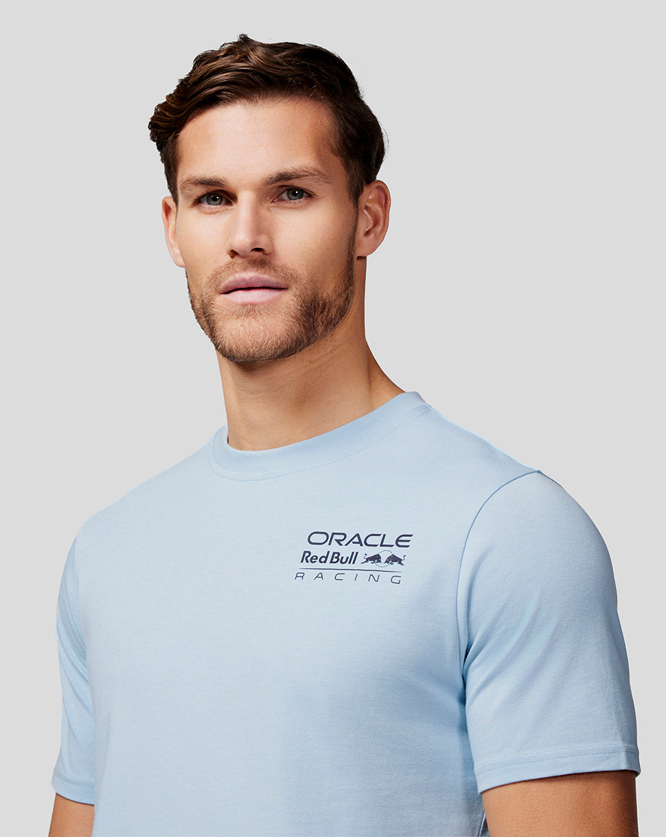 Male model wearing Dream Blue Oracle Red Bull Racing Core Tee with left chest logo