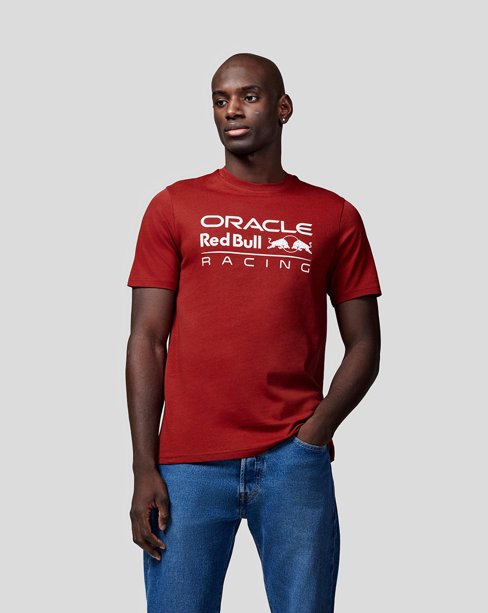 Male model wearing Oracle Red Bull Racing mono logo tee in Winery red with white chest branding