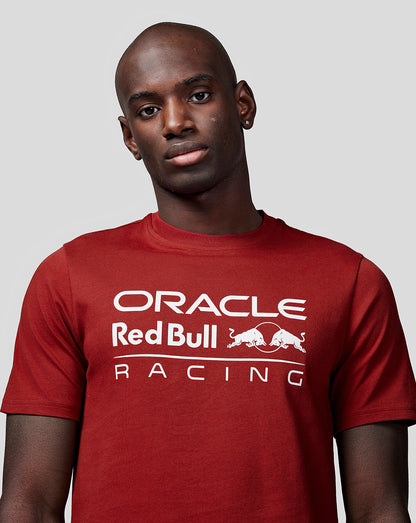 Torso close up of model wearing Oracle Red Bull Racing tee Winery red with large white logo on the chest