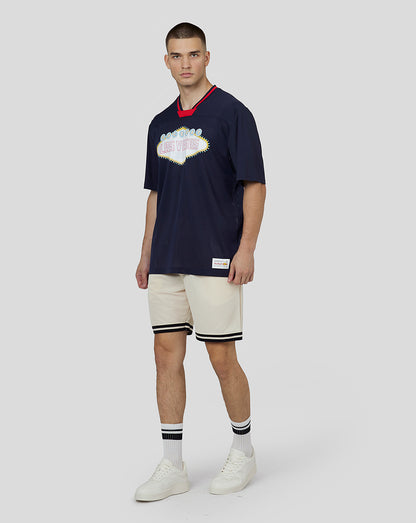 Male model wearing navy Oracle Red Bull Racing Vegas American Football Jersey with Las Vegas sign graphic.