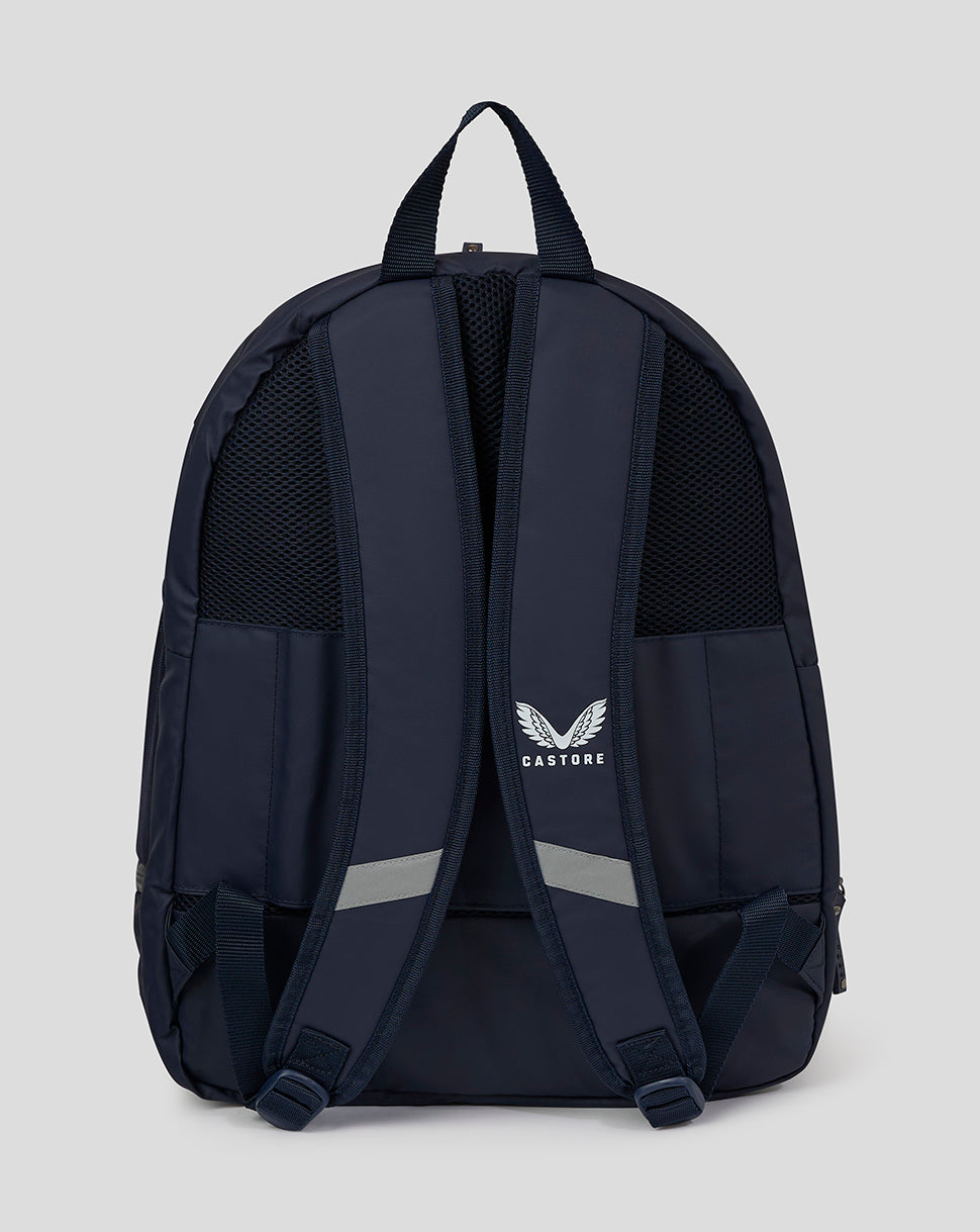Back view of peacoat navy Castore backpack with padded shoulder straps and top handle.