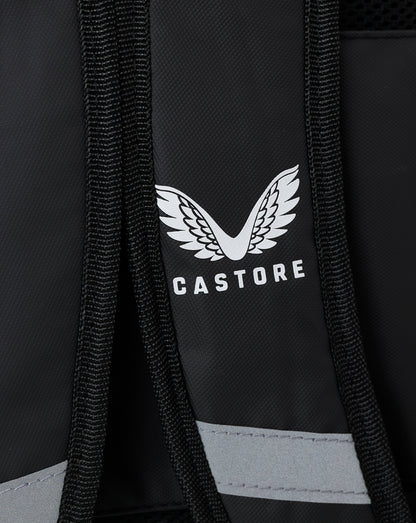 Close up of black backpack strap with Castore logo on the front panel