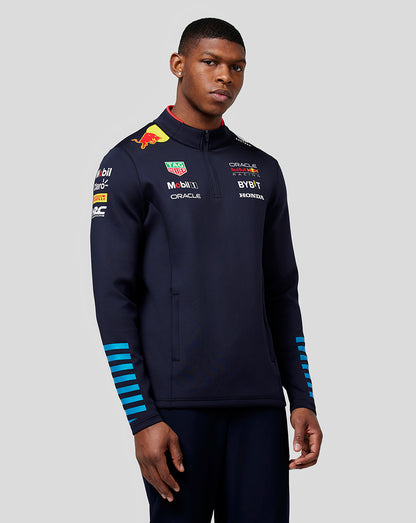 Navy unisex quarter zip midlayer with Red Bull Racing logos worn by model
