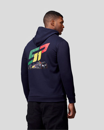 Back view of a man in a navy Oracle Red Bull Racing hoodie with a bold colorful graphic of a race car on the back