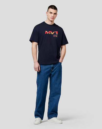 Full outfit shown: model wearing navy oversized Max Pop Art Tee with MV logo on chest, jeans and white sneakers.