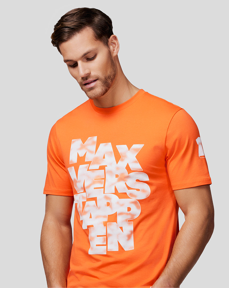 Side-angle view of male model in exotic orange Max Expression Tee showing prominent white graphic on the chest