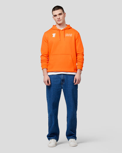 Full body front view of a model wearing the orange Max Expression hoodie with white number 1 on the chest and Oracle Red Bull Racing logo