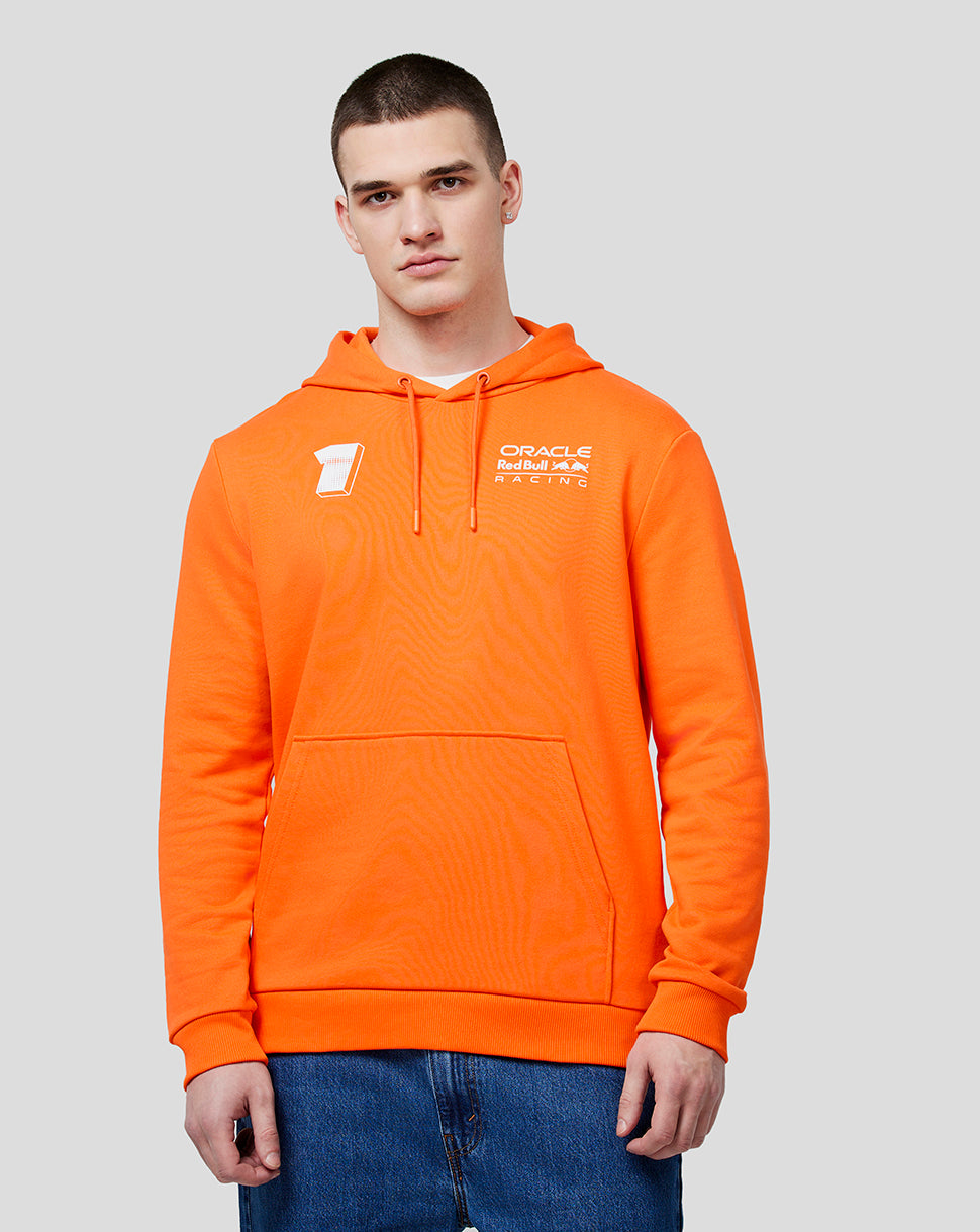 Male model in bright orange Max Expression hoodie with drawcord hood and chest logo.