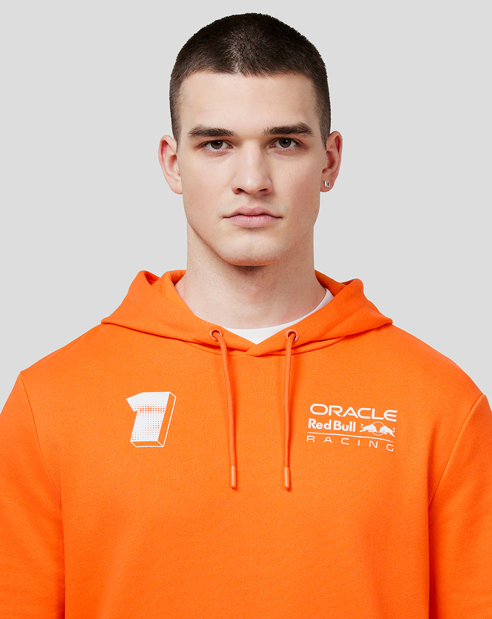 Front view of bright orange Max Expression hoodie on a model with a white number 1 on the left chest and Oracle Red Bull Racing logo on the right chest