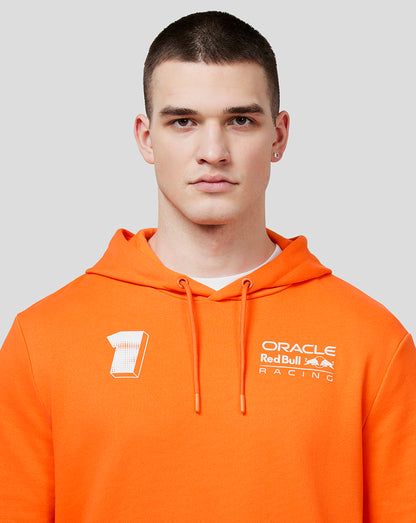 Front view of bright orange Max Expression hoodie on a model with a white number 1 on the left chest and Oracle Red Bull Racing logo on the right chest