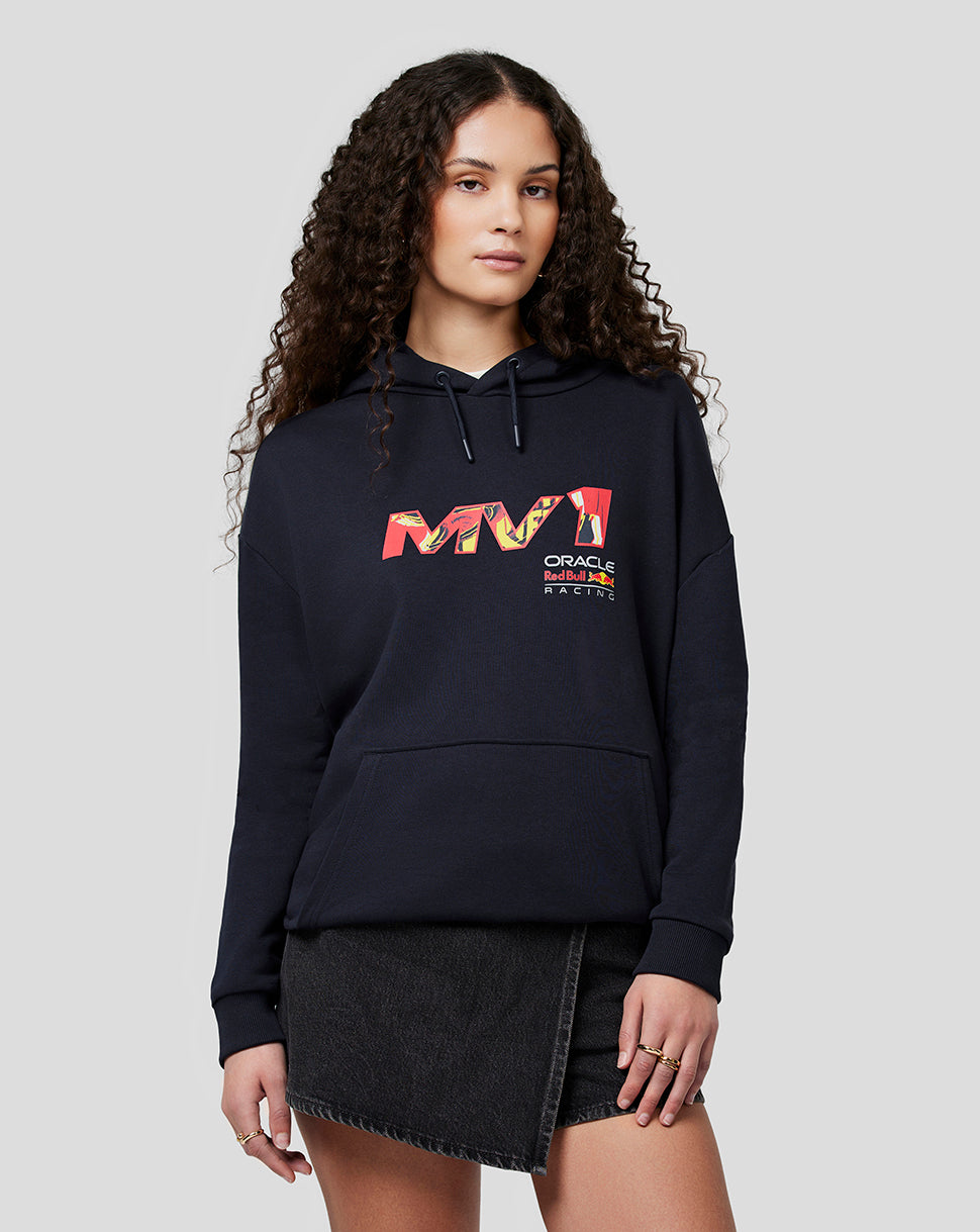 Woman wearing navy Oracle Red Bull Racing Max Pop Art oversized hoodie with bold multicolor graphic on the front and back and a drawstring hood