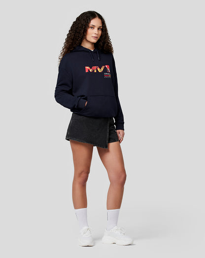 Model wearing Oracle Red Bull Racing Unisex Max Pop Art Oversized Hoodie in night sky navy with colorful front and back pop art graphics
