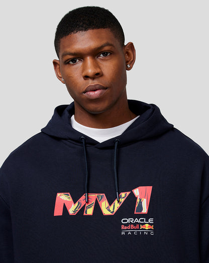 Close-up of male model in a navy hoodie with a colorful front pop art graphic and drawstring hood.