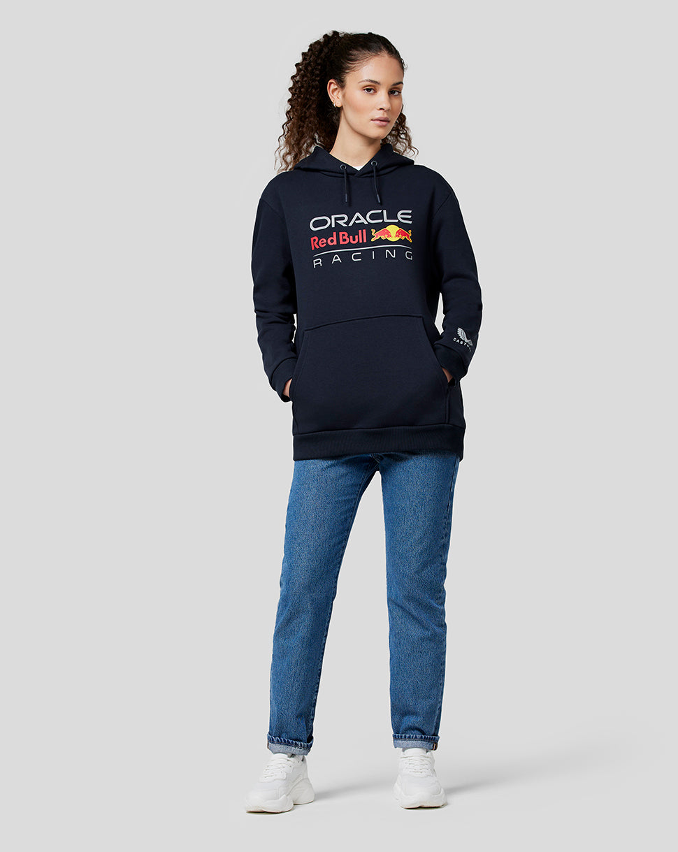 Model wearing navy Oracle Red Bull Racing unisex hoodie with large chest graphic, drawstring hood and front pocket.