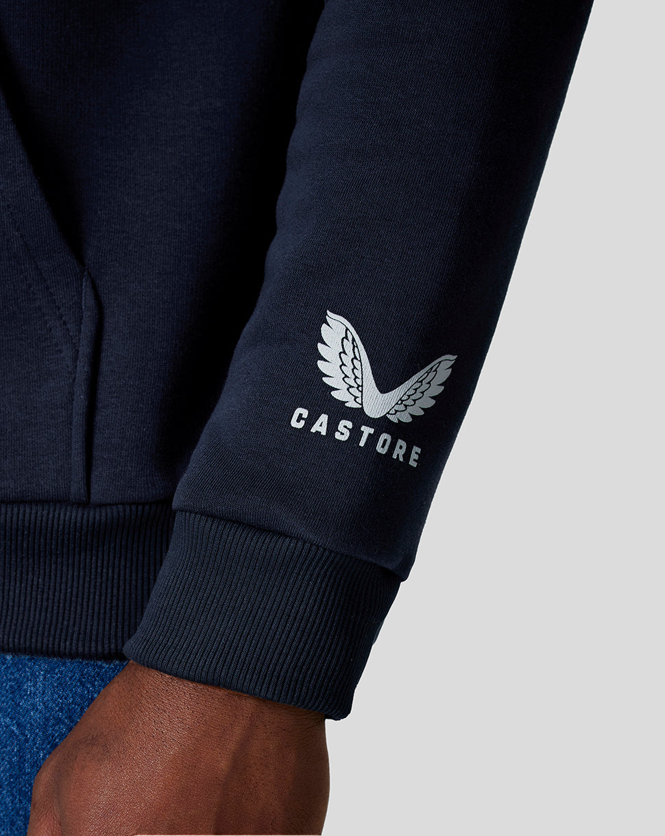 Close-up of navy hoodie sleeve displaying Castore logo near the cuff.